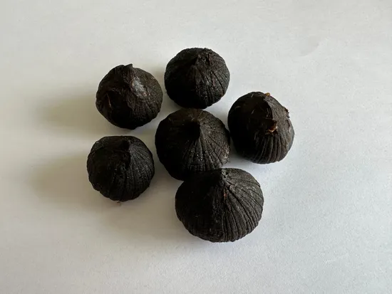 Chinesischer fermentierter geschälter Solo-Schwarzknoblauch